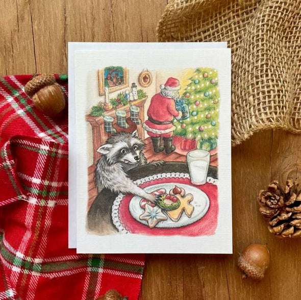 Aubree Sue Art Holiday Greeting Card - "Stealing Santa's Cookies" Raccoon