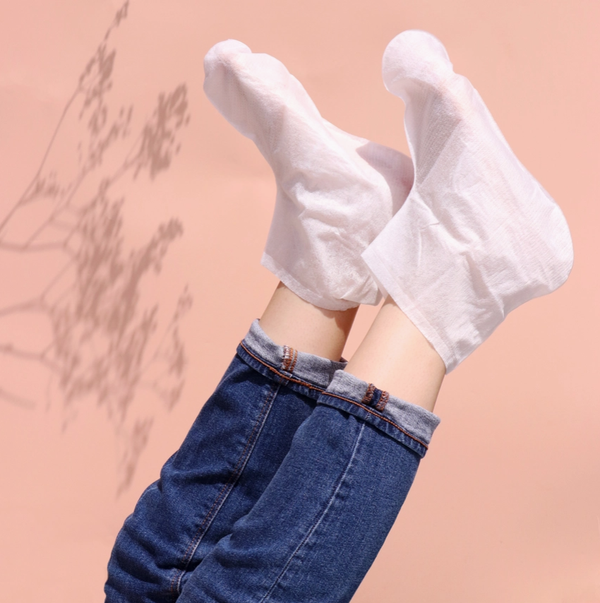 Spearmint and tea tree foot mask in use on feet by my spa life