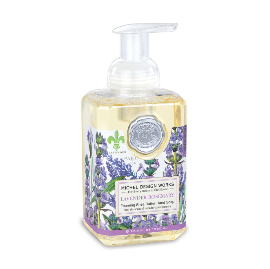 Foaming hand soap bottle with lavender design on a white background. Lavender Rosemary scented shea butter soap.