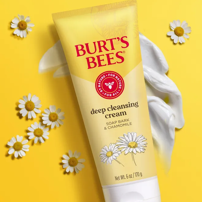 soap bark and chamomile deep cleansing cream by burt's bees yellow tube surrounded by flowers