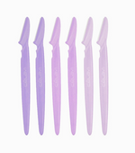 6 "Precision Beauty Razors" by Celavi. The razors have long plastic handles in shades of purple and pink, and the covers have been removed to reveal slim blades.