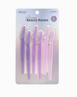 A package of 6 "Precision Beauty Razors" by Celavi. The razors have long plastic handles in shades of purple and pink, and each blade has a over on it.
