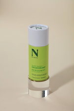 stick of deodorant in plastic free packaging light green label bergamot scented deodorant zero waste deodorant