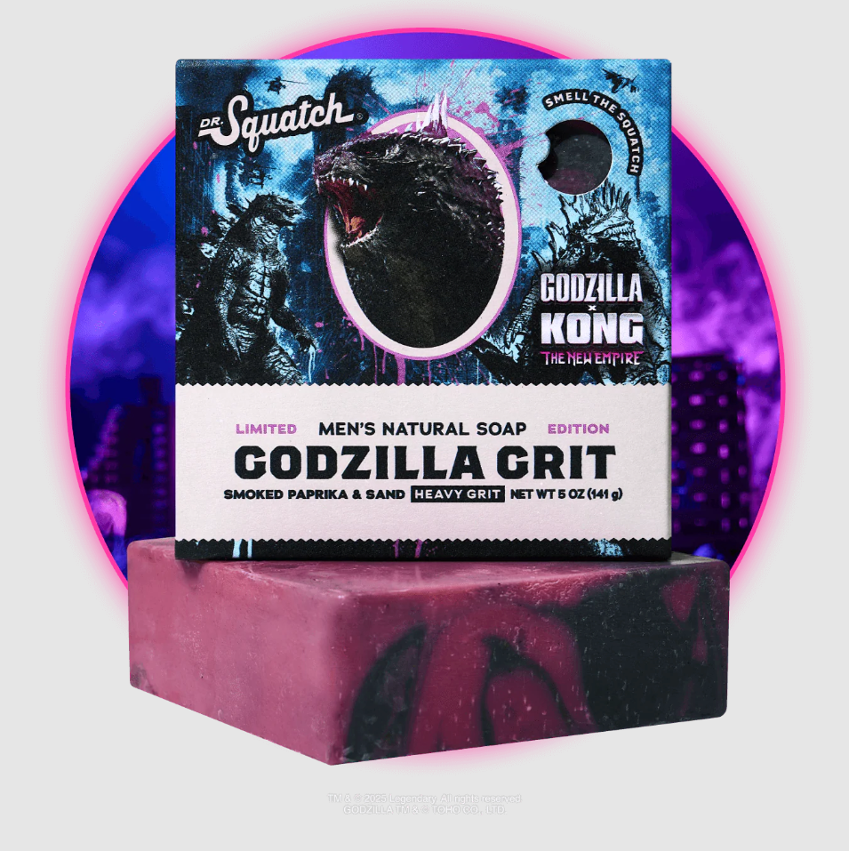 Marbled heavy grit soap bar with packaging featuring Godzilla design on a white background