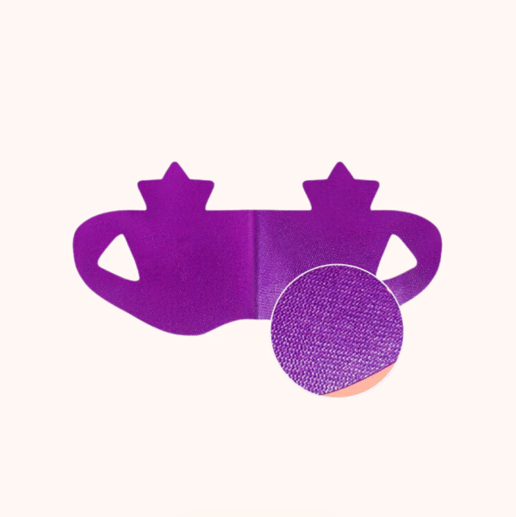 Purple mask with star design and ear loops. Circle enlarged to show texture.