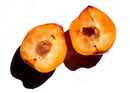 orange peach cut in half open to indicate peach fragrance available for custom scented perfume lotion