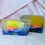Colorful soap with a mermaid design on a white background blue rocks mermaid with loaf