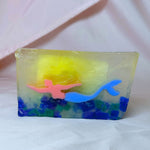 Colorful soap with a mermaid design on a white background blue rocks mermaid