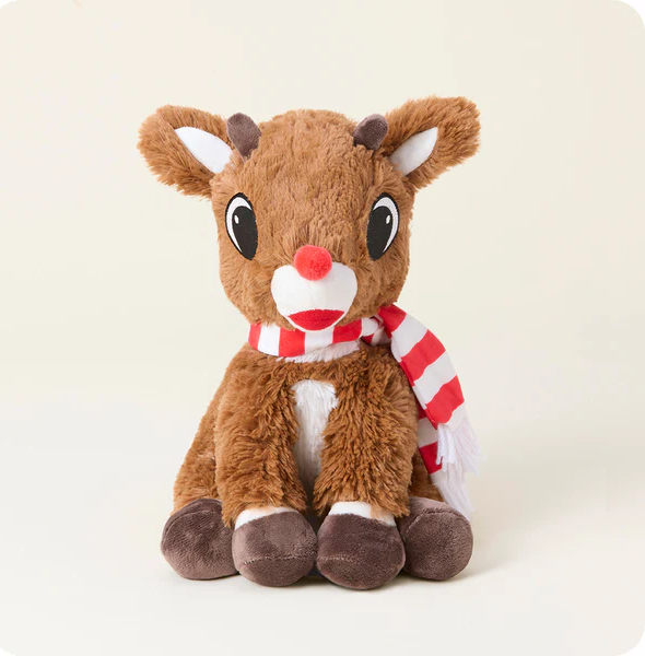 Plush reindeer toy with a red and white striped scarf on a light background