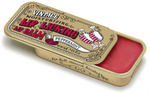 Peppermint flavored lip balm in a gold vintage-style tin with red lip balm inside on a white background