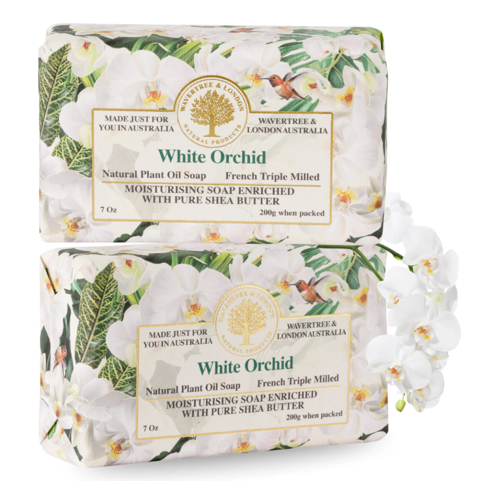 Two wrapped bars of Wavtree & London White Orchid natural plant oil soap stacked vertically on a white background, with white orchid flowers printed on the packaging.