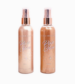 Two tall spray bottles with a shimmery tan color. Holographic rainbow text reads "Pixie Glow".