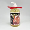 mary lake thompson liquid soap in pump bottle with red ribbon and ox with birds on horns and holly illustration. Pine balsam scent. Gift for holiday christmas.