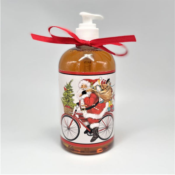 mary lake thompson liquid soap with pump and red ribbon, santa riding bike with sack of toys, gift for christmas holidays, peppermint scent.