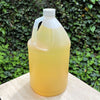 gallon bottle of 100% pure sweet almond oil moisturizing for body custom scent fragrance
